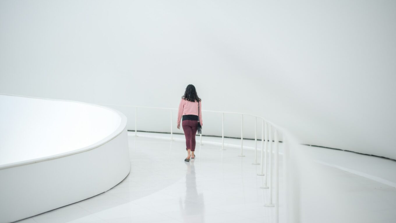 Female walking in the museum